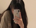 九***